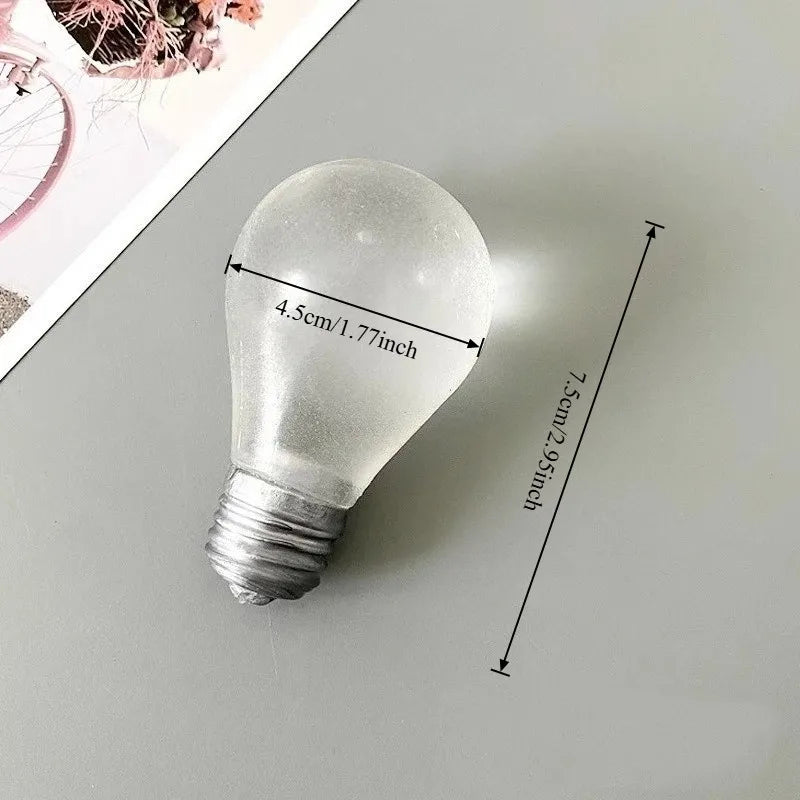 GlowBulb Squish | Glow-in-the-Dark Light Bulb Squishy